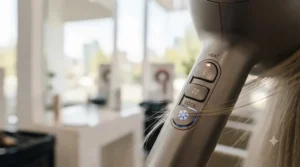 Professional hair dryer with variable heat settings.