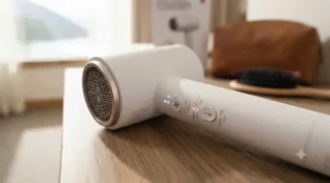 A detailed graphic emphasizing the adjustable heat and speed settings on a portable wireless travel hair dryer.