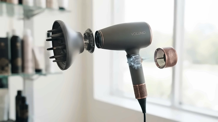 Ergonomic hair dryer design with integrated diffuser.